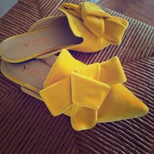 Yellow velvet mules